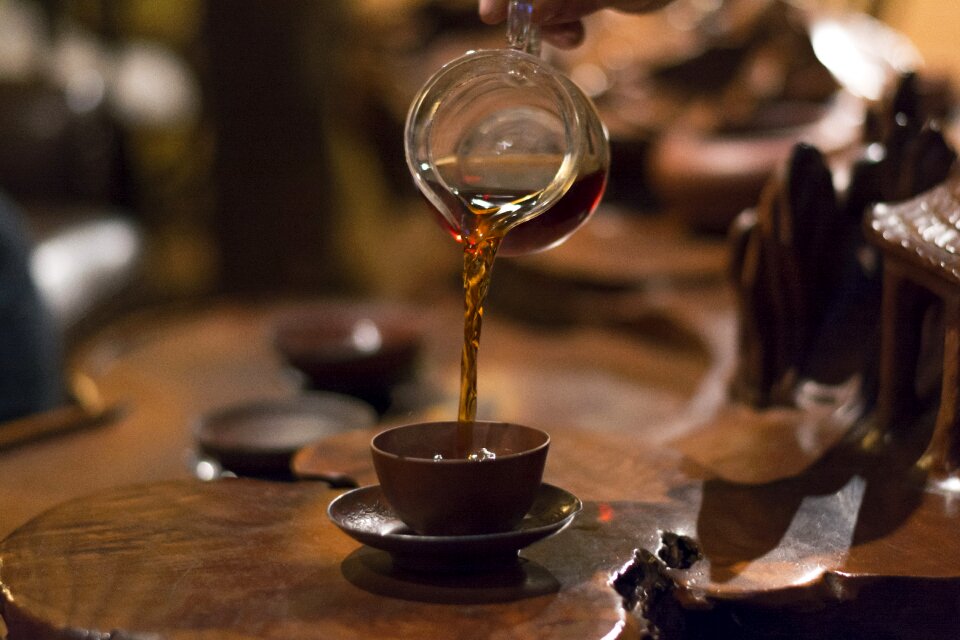 Pouring beverage brown tea photo