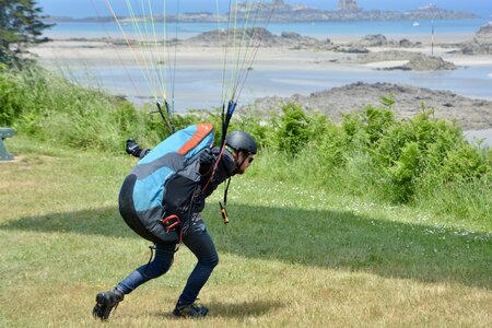 Paraglider pilots near takes off leisure sports free flight photo