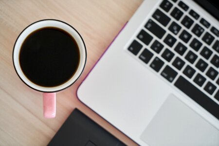 Cup laptop espresso photo