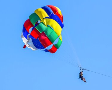 Flying paragliding balloon photo