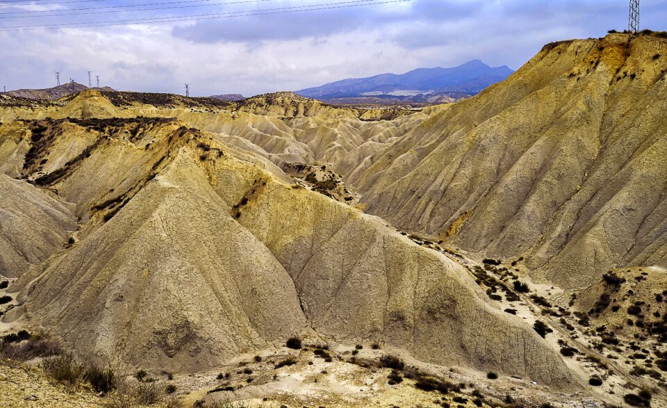 Rolling mountains barren land landscape photo