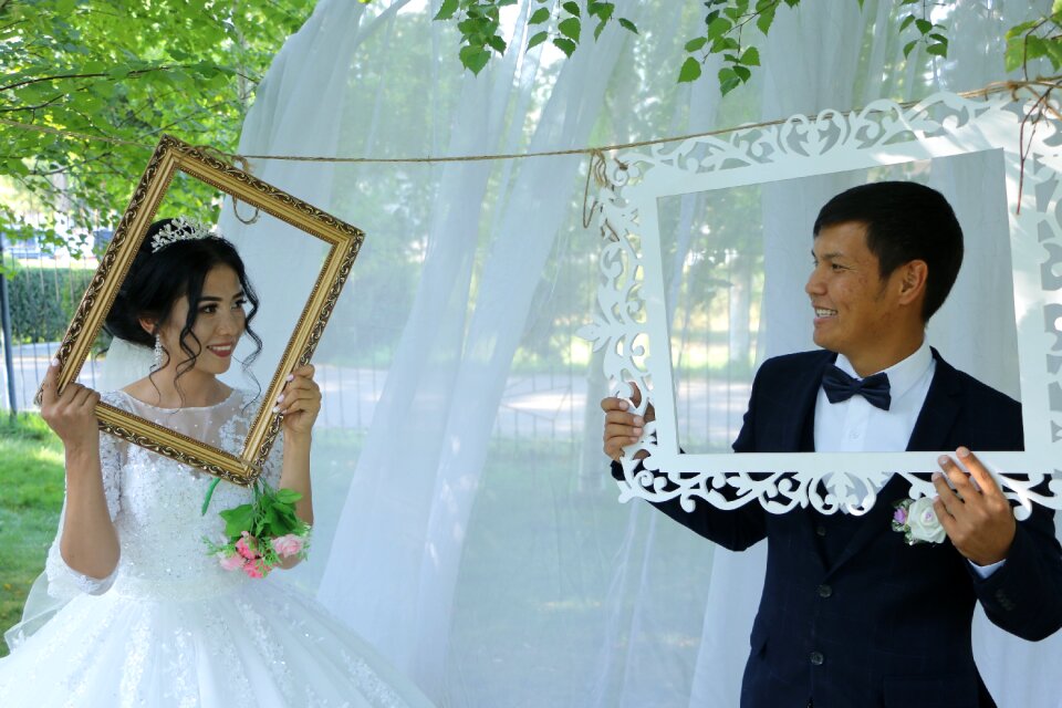 Groom frames picture time