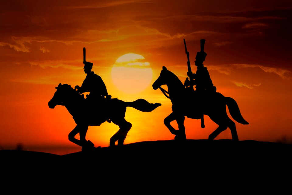 Sunset silhouettes army