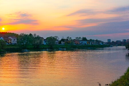 Covered bridge of pavia sunset the river ticino photo