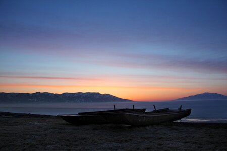 Snow mountain sunrise boat photo