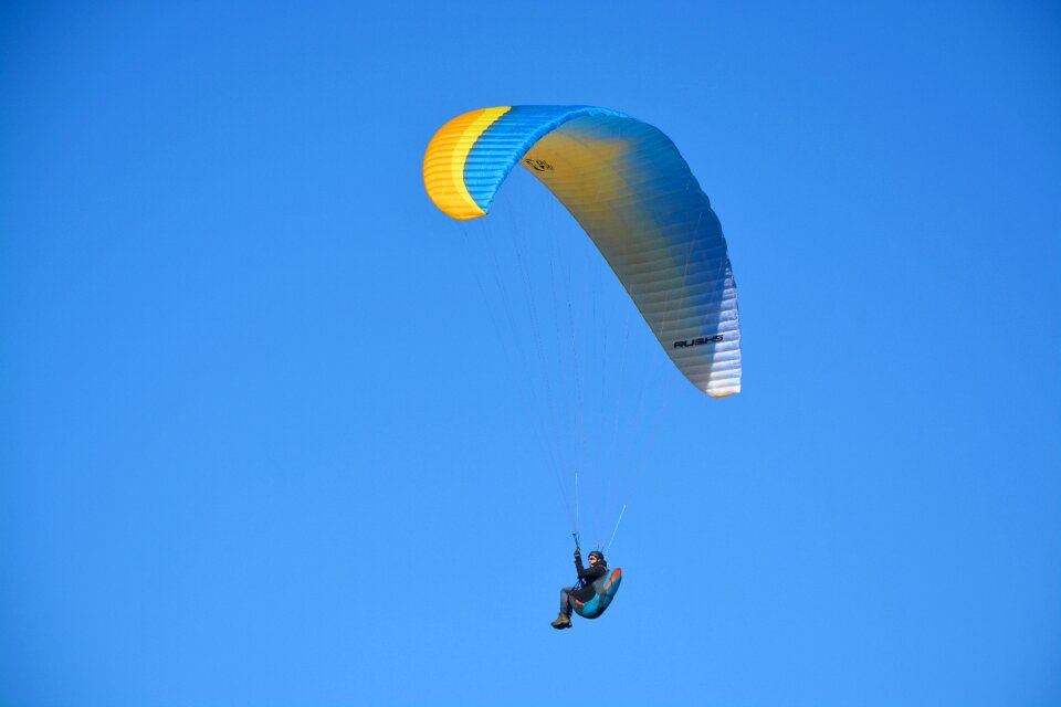 Sail blue orange yellow flying site aircraft