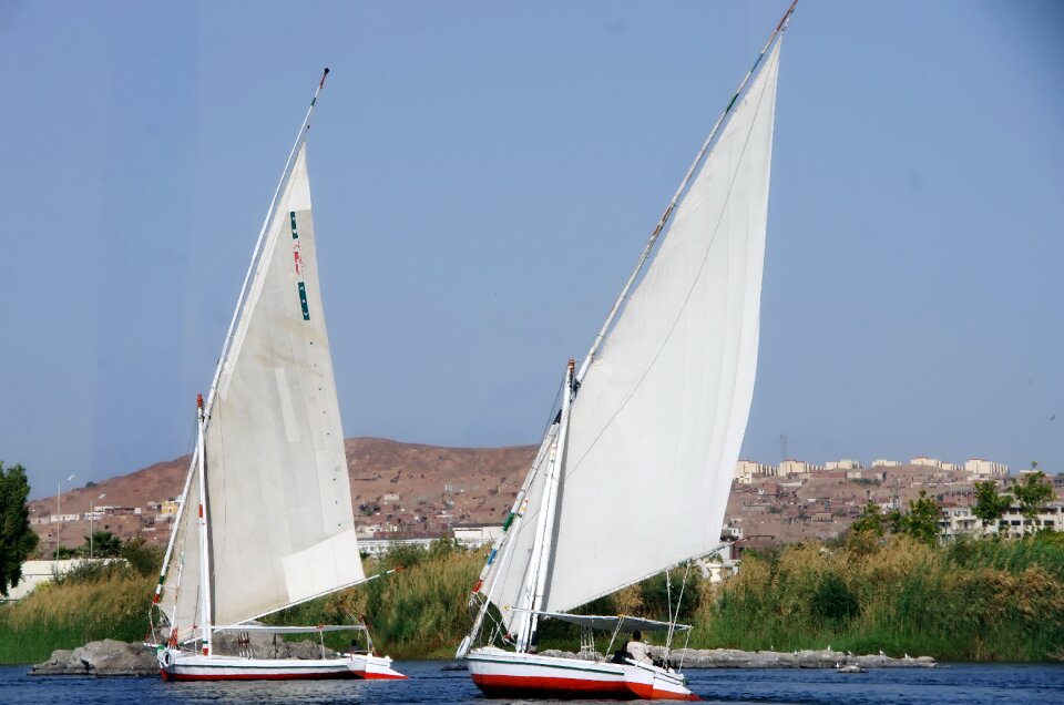 Body of water boat sailboat