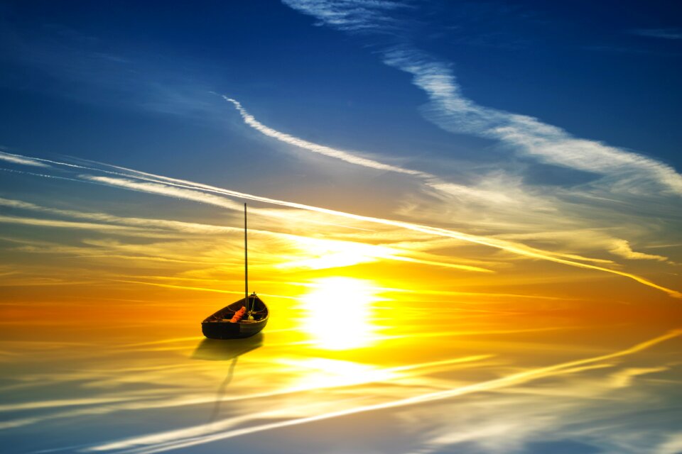 Boat mirroring water