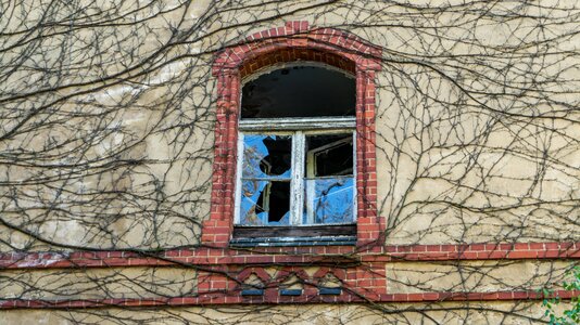 Old window house facade bricks
