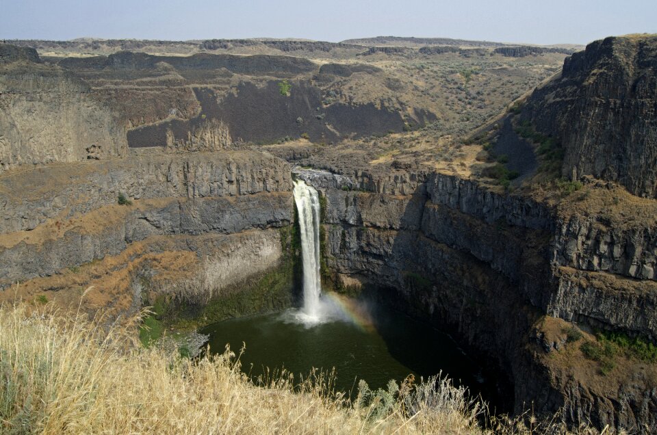 Basaltic rock dry grass rainbow