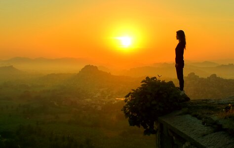 Woman looking watching sunrise