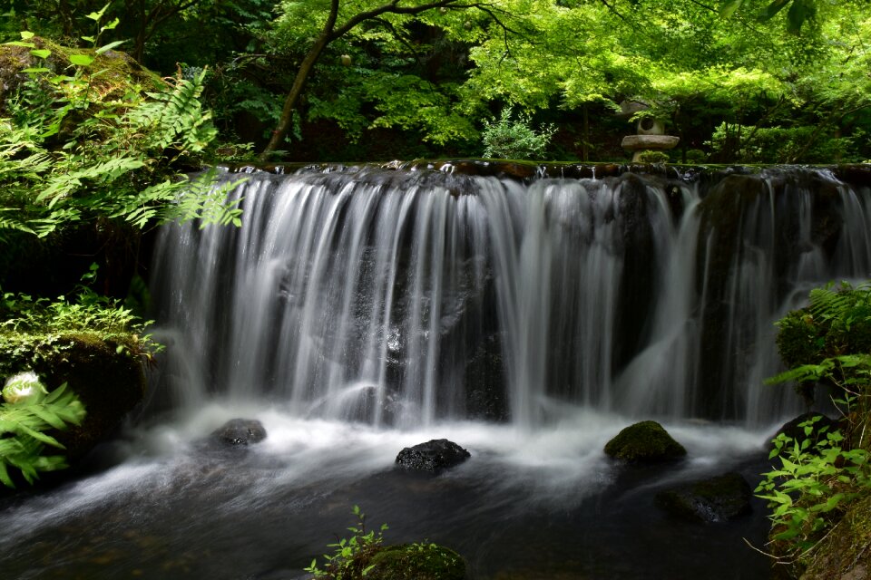 Fresh green river waterfall photo