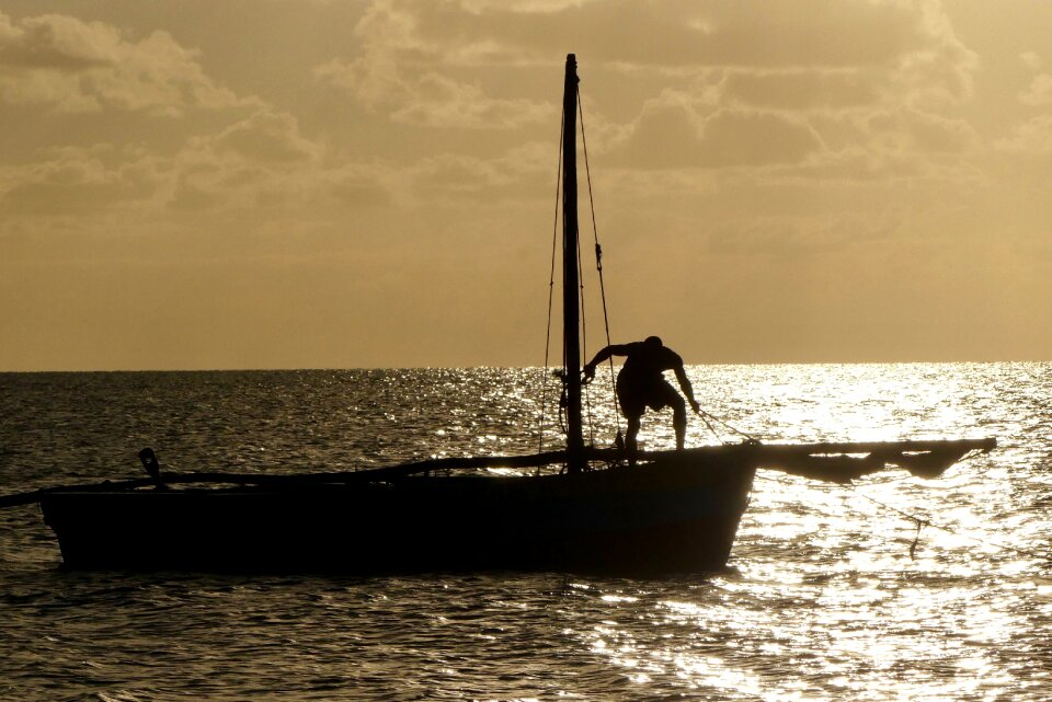 Boat fisherman brown boat photo