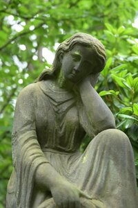 Grave sculpture mourning photo