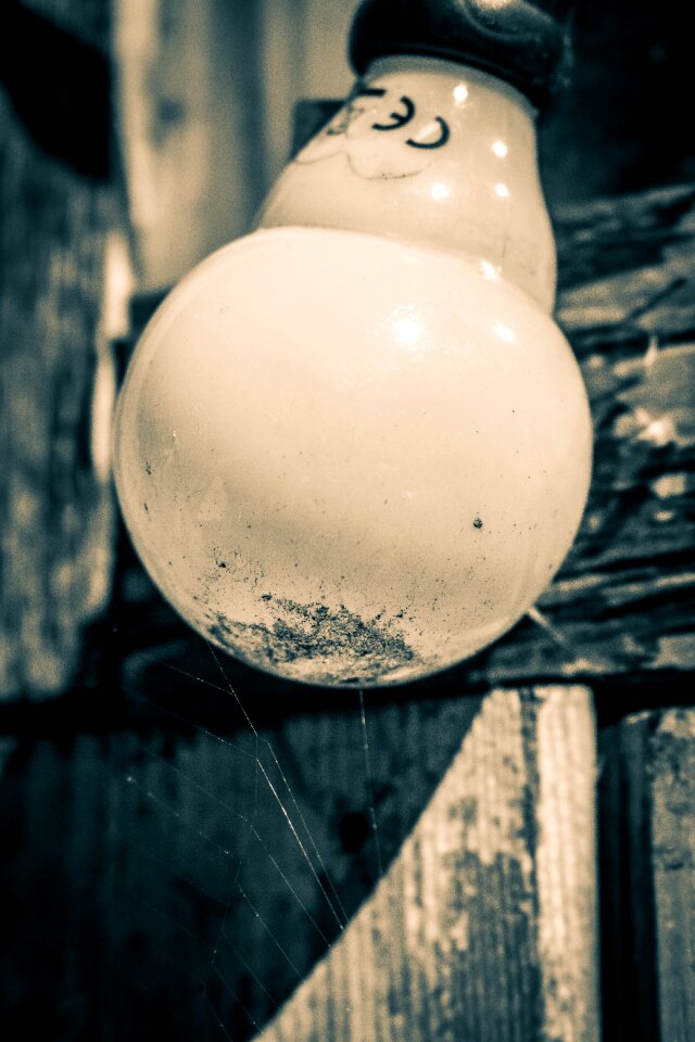 Light bulb weathering wooden structure