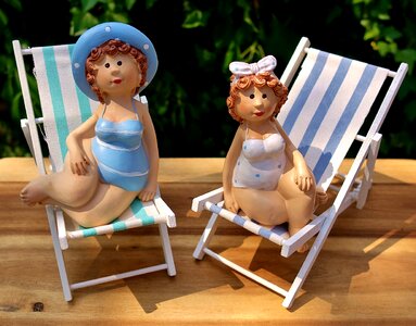 Figures deck chair sun photo