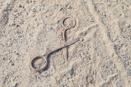 Sand rusty scissors abandoned thing