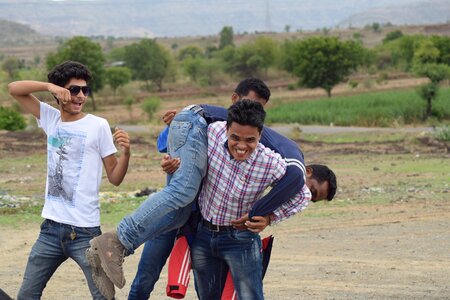 Adult friends group play fighting