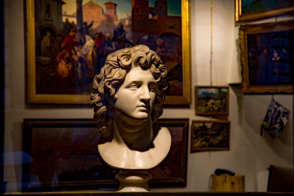 Antique dealer bust statue