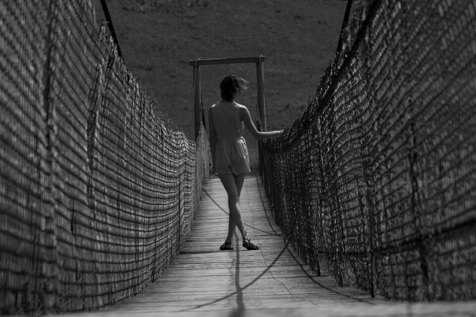 Woman white and black bridge