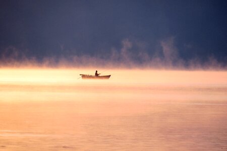 Boat fisherman loneliness photo