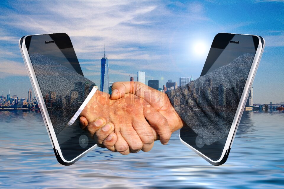 Contract hands smartphone
