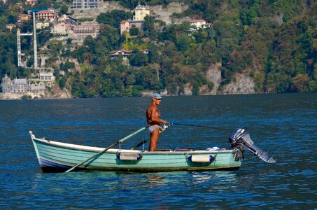 Lake rowing boat swimming trunks photo