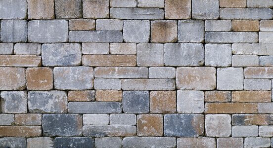 Bricked composite stones garden wall photo