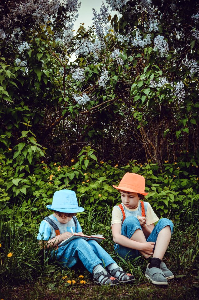 Boys read with a book