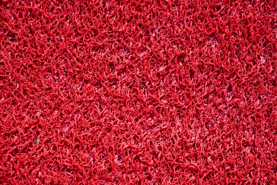 Synthetic surface carpet