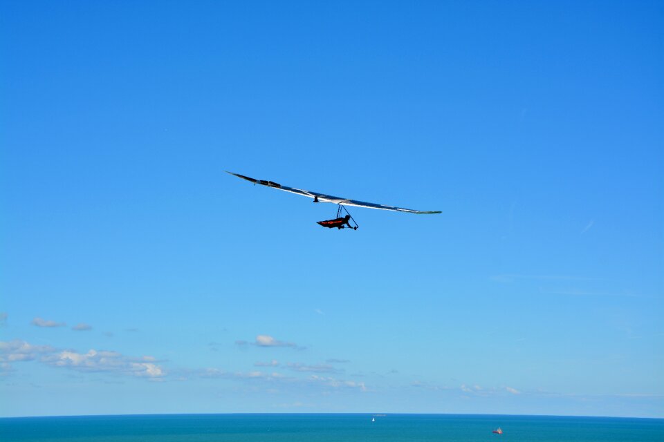 Blue sky sea flight photo