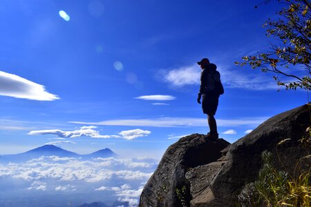 Mountain hiker backpacker photo