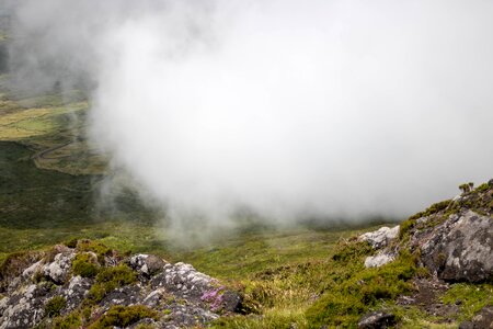 Clouds vegetation rocks