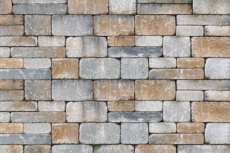 Bricked composite stones garden wall photo