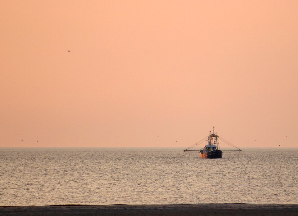 Sunset north sea ship