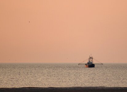 Sunset north sea ship