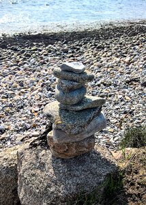 Stone sculpture rocky coast sea