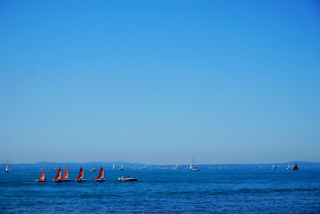 Alpine mountains boats photo