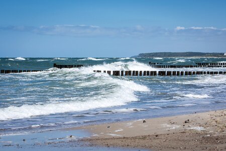 Groynes blue water photo