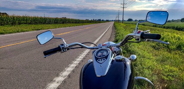 Motorcycle road sky reflection photo