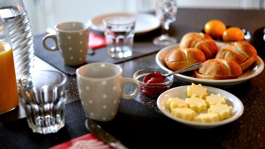 Breakfast table covered eat photo