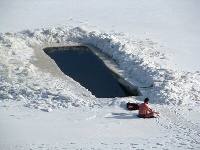Ice hole bathing river photo