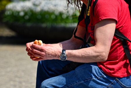 Finger holding sitting photo