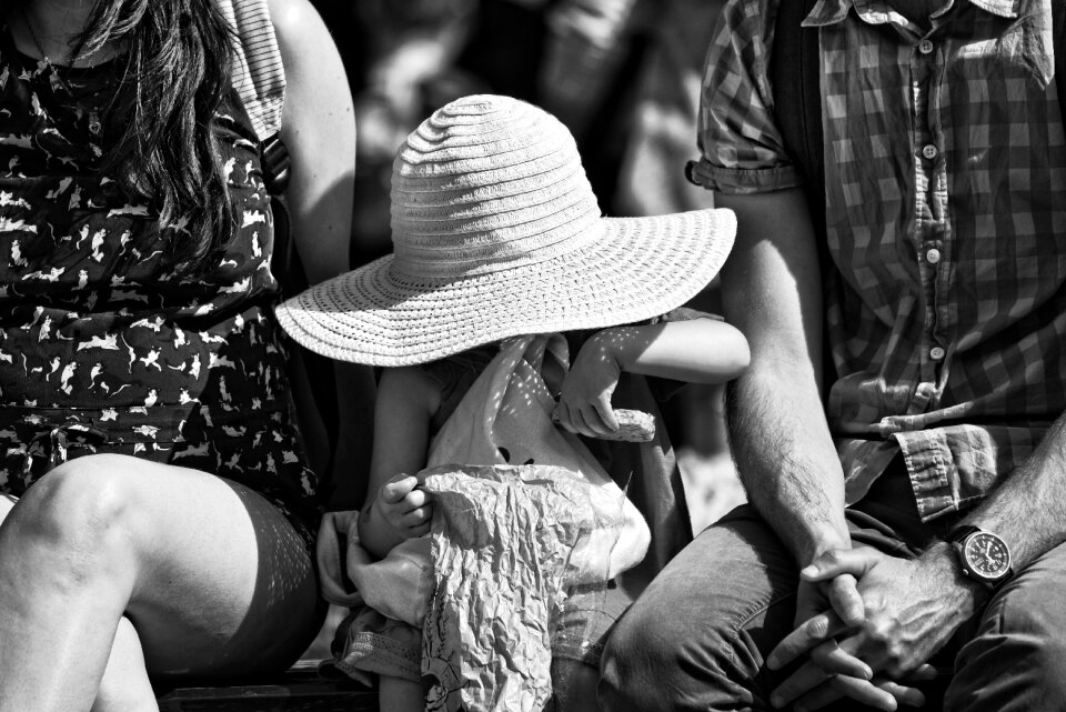 Man woman little girl sitting