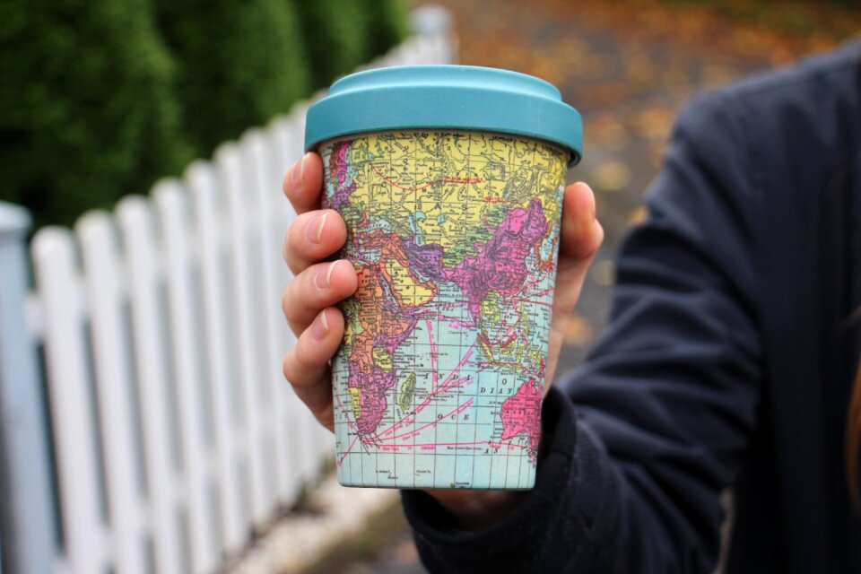 Cup holding person