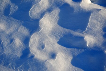 Snowy field snowdrifts surface