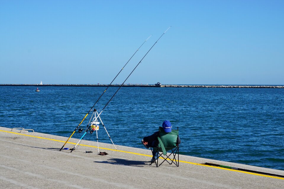 Fishing sun sea