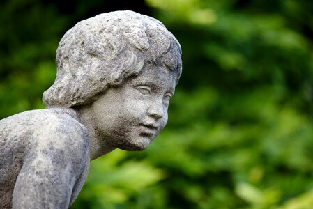 Green face stone figure