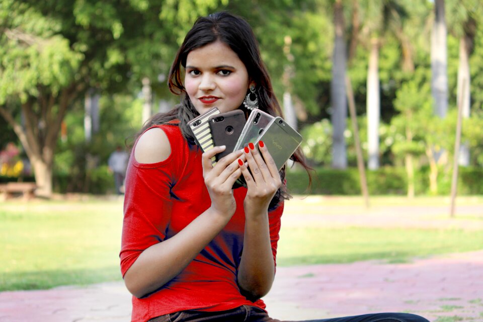 Mobile with girl indian girl in red dress smartphone