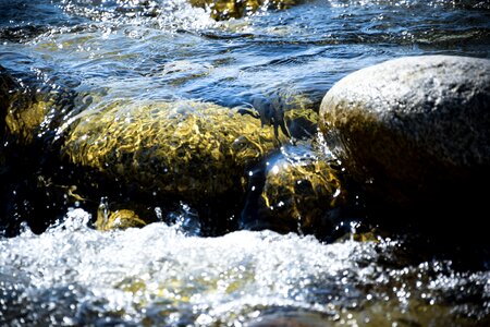 Flowing river stone photo